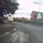 Road surface with patch of fluid