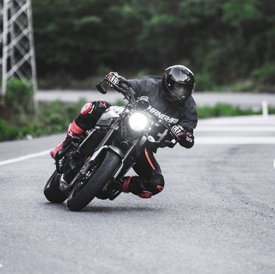 Motorcycle leaning into corner